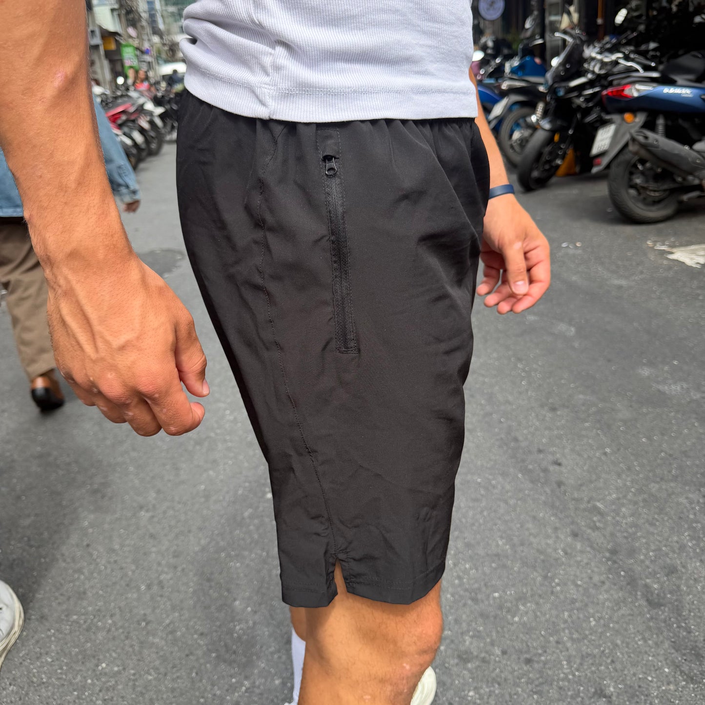 Short de sport (avec poches zippées)