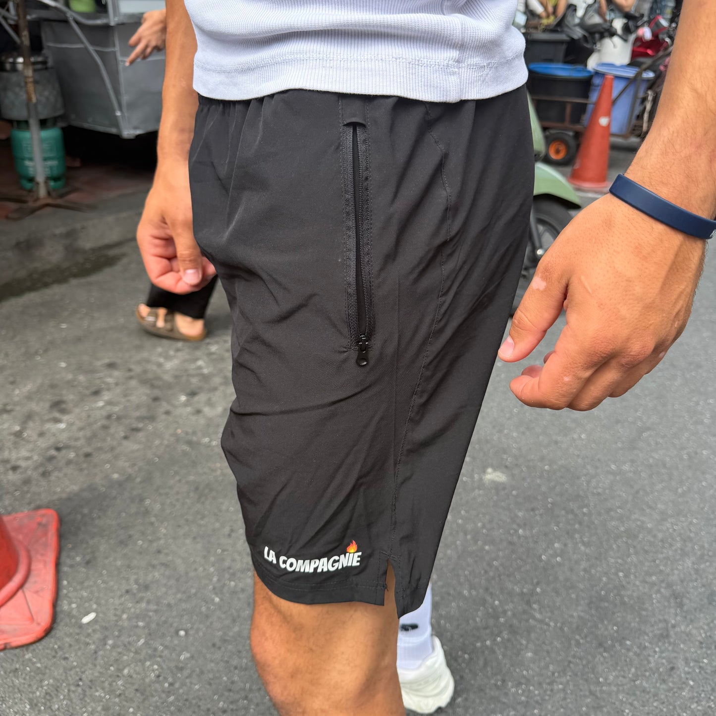 Short de sport (avec poches zippées)